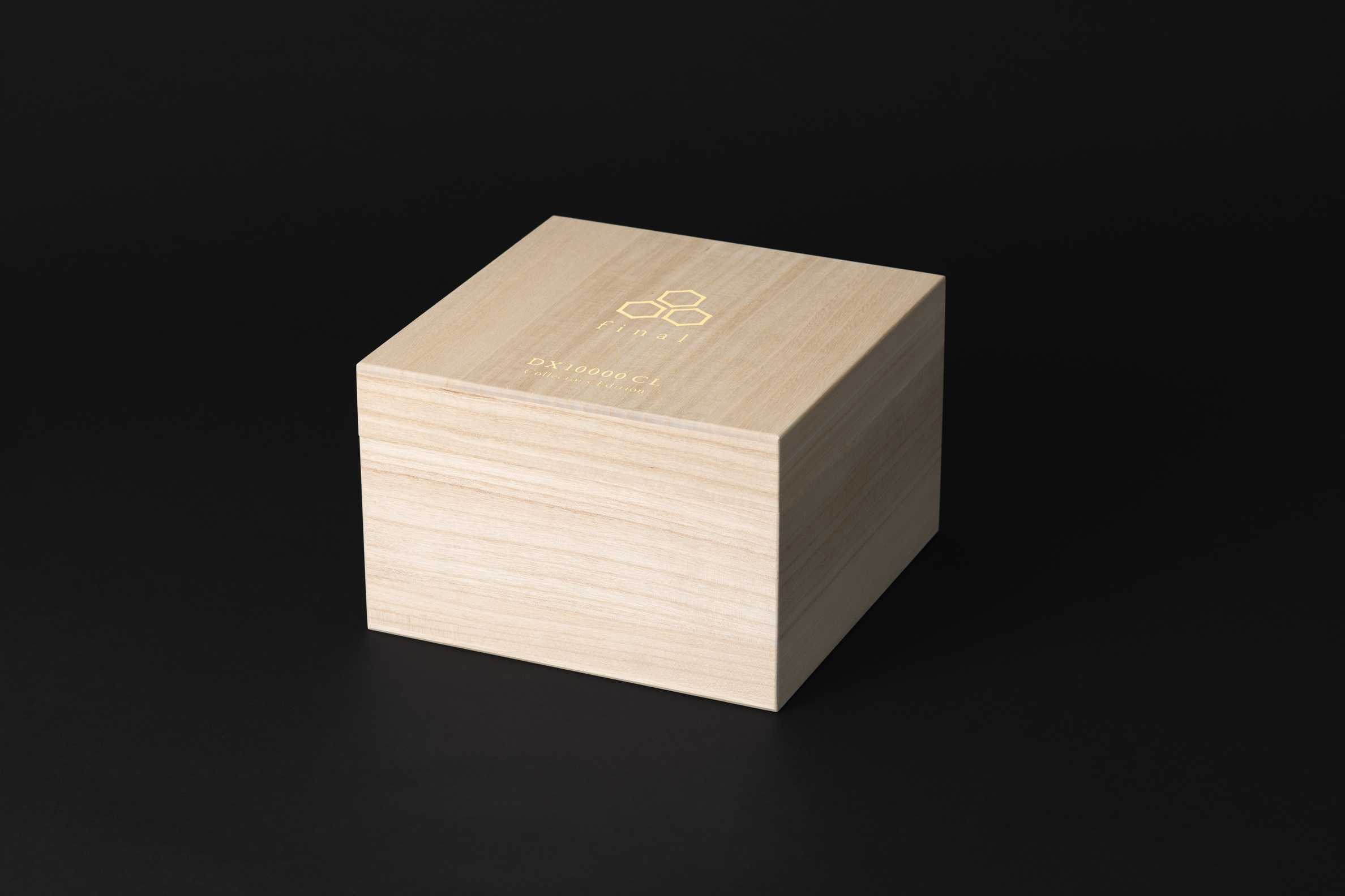 closed Japanese paulownia wood box with gold-colored final emblem